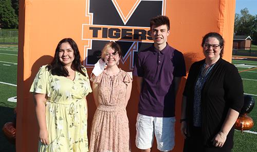 MACS Seal of Biliteracy recipients pictured alongside Mrs. Bush at the June 2021 Senior Awards cermony